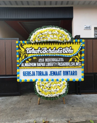 Papan Bunga Duka di Gumay Talang